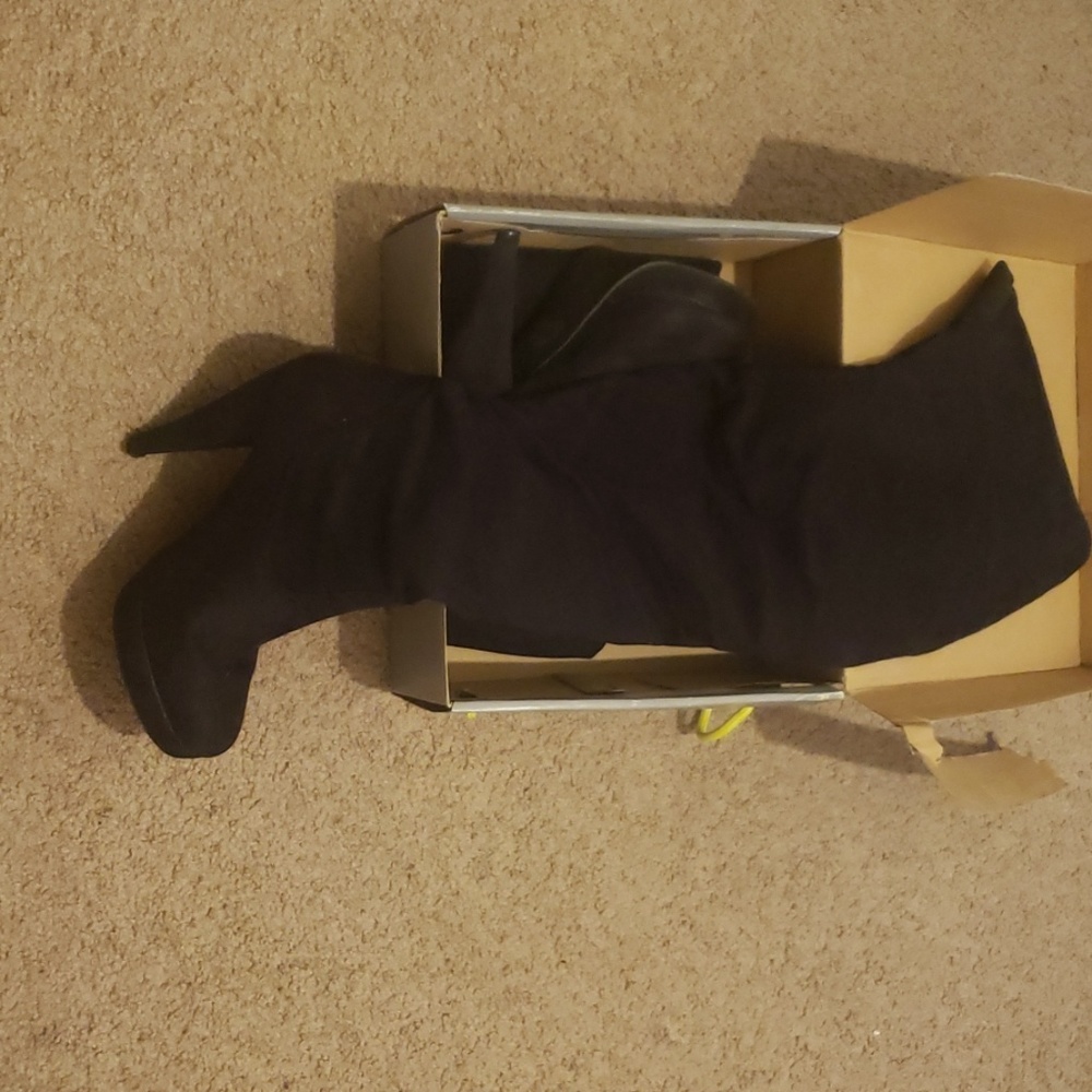 Thigh high boots.